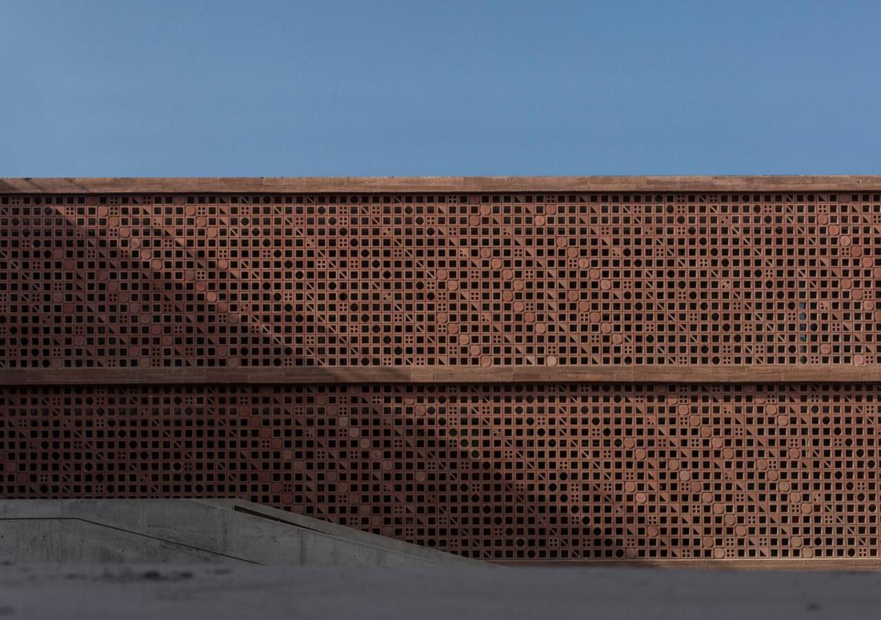 Potato Head Suites&Studios Seminyak Exterior foto The perforated brick facade
